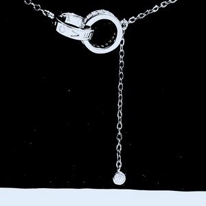 Moissanite love necklace  16 inch extend to 17 inch with a .5 drop diamond.